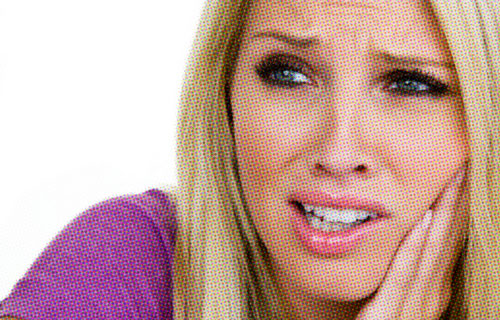 woman looking worried about her mouth thrush problem